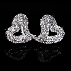 Elegant heart-shaped stud earrings in silver-plated metal with shimmering zircon stones