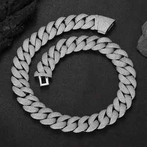 Detailed close-up of 22MM silver Cuban link chain with full pavé cubic zirconia setting