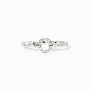 Anello in argento sterling S925 con cerchio di zirconi e fascia a treccia lucida