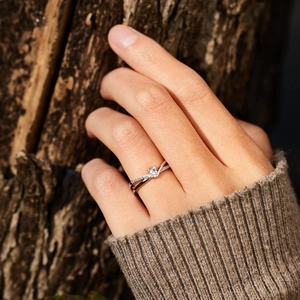 Elegant S925 sterling silver V-shaped heart ring with cubic zirconia worn on hand