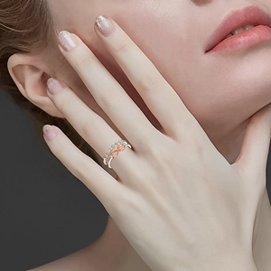 S925 sterling silver infinity ring with sparkling zircons shown on model hand
