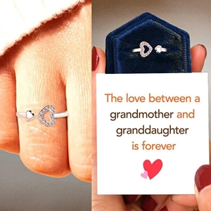 Detail of adjustable S925 silver double heart ring with CZ diamonds and gift card