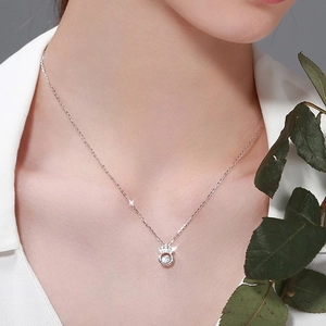 Sparkling S925 sterling silver crown necklace with a brilliant dancing heart gemstone pendant