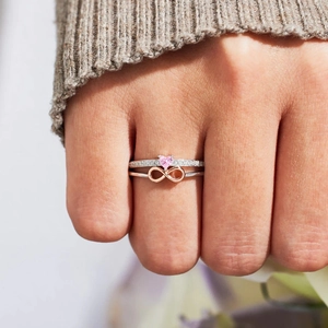 S925 sterling silver ring set with pink heart stone and rose gold infinity symbol
