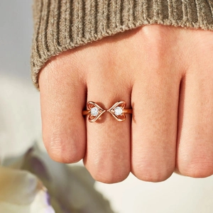 Bague ouverte double cœur en argent s925 or rose sertie de zircons blancs brillants