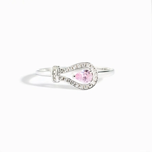 Elegant S925 sterling silver ring with a pear-cut pink gemstone and pavé diamonds
