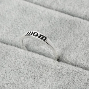 Minimalist S925 sterling silver ring with MOM lettering displayed in a jewelry box