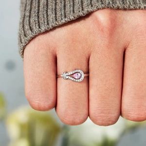 S925 sterling silver buckle ring with pink pear-shaped stone and micro-pave crystals