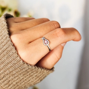 S925 silver ring featuring pink pear-cut stone and micro-pave diamond halo