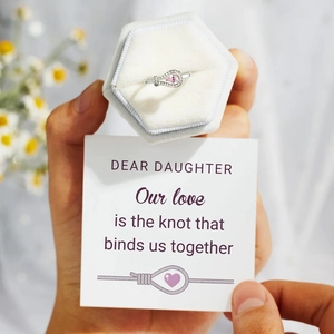 Pink heart crystal knot ring in a velvet box with a sentimental message card for daughter