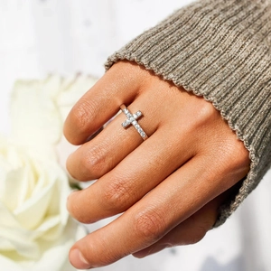Minimalist S925 sterling silver cross ring with pavé zircons worn on hand