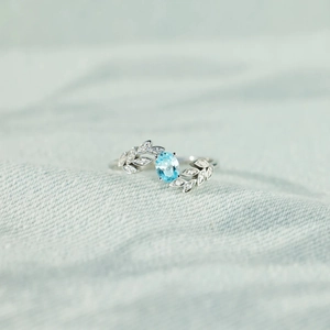S925 Sterling Silver Leaf Ring with Oval Light Blue Gemstone and Zircon Accents