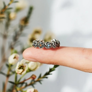 Detailed view of s925 silver rose ring with colorful crystals and vintage black finish