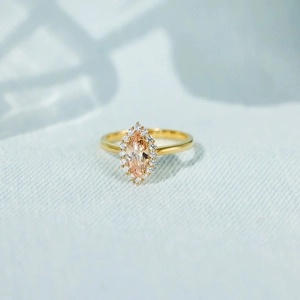 Elegant S925 silver marquise-cut champagne zircon ring with a golden halo setting