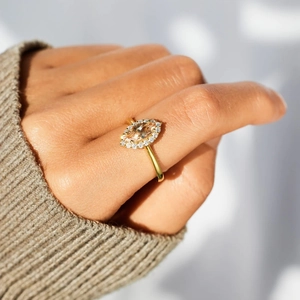 Marquise cut champagne zircon s925 silver ring with halo diamonds on model finger