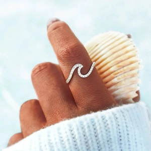 Elegant S925 sterling silver ocean wave ring with sparkling cubic zirconia crystals for women