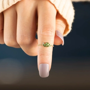 Gold S925 sterling silver ring featuring a green enamel cloud and small diamond accent