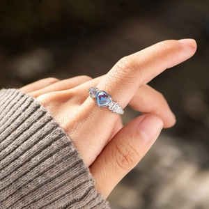S925 sterling silver ring featuring a heart-shaped blue opal and sparkling zircon accents