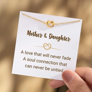 S925 sterling silver gold knotted heart bracelet on a Mother & Daughter gift card
