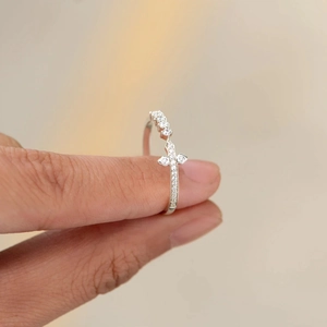 Elegant S925 sterling silver cross ring with pavé zircons shown in a macro side view