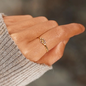 Elegant S925 sterling silver infinity heart ring with pavé stones and twisted band