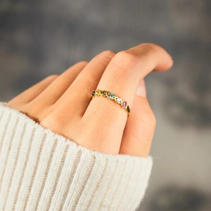 S925 Sterling Silver XOXO ring with six colorful birthstones worn on a hand
