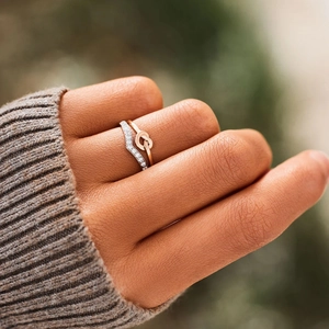 Elegant S925 sterling silver V-shape diamond ring and rose gold knot ring stack on hand