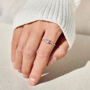 Elegant S925 sterling silver ring featuring a square pink zircon and side accents