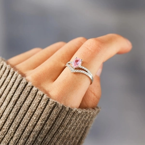 Elegant S925 silver V-shaped ring with pink pear-cut zircon and pavé crystal accents