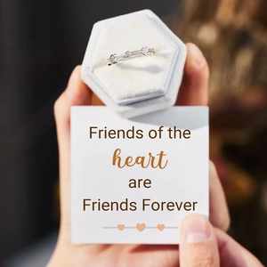 Close-up of S925 silver heart ring with pavé zircons in a premium velvet gift box