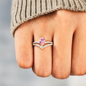 S925 sterling silver herringbone ring featuring a pear-shaped pink stone and V-shaped zircons