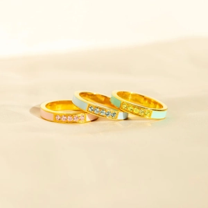 Three-piece stackable gold vermeil rings with colorful enamel and cubic zirconia stones