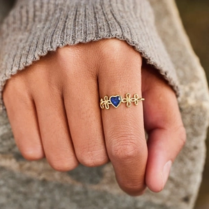 Bague élégante en argent S925 doré avec pierre de cœur bleue et motif infini tissé