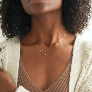 Elegant S925 sterling silver infinity pendant necklace with cubic zirconia on gold chain