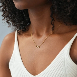 Minimalist S925 sterling silver infinity necklace in gold finish with sparkling pavé stones