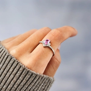 S925 sterling silver ring with pear-cut pink stone and sparkling pavé diamonds