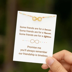 Gold infinity necklace with colorful beads on a message card for women jewelry