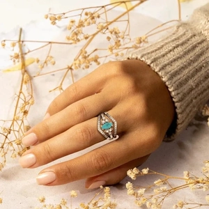 S925 sterling silver herringbone ring featuring marquise turquoise and diamond accents