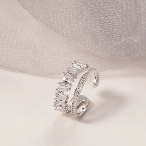 Macro detail of s925 silver double-layer ring with baguette and round zircon stones
