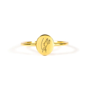 Polished S925 sterling silver golden ring featuring an oval face with hand-holding art