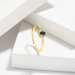 Elegant S925 sterling silver ring with a pear-shaped black stone and diamond halo