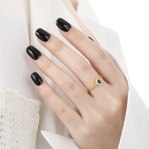 S925 sterling silver gold ring featuring a pear-shaped black stone with zircon halo