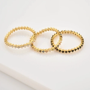 Minimalist s925 silver rings with black and white zircon row settings on white background