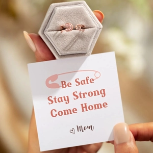 Rose gold safety pin ring with pave stones and sentimental message card in velvet box
