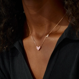 Elegant S925 sterling silver necklace with pink heart zircon pendant on a gold chain