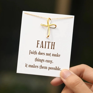 Collier croix infini bicolore en argent sterling S925 sur une carte de message