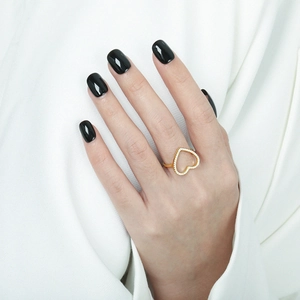Elegant gold S925 silver ring featuring a hollow heart-shaped sparkling zircon pavé design