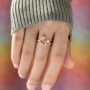 Rose gold S925 sterling silver crown heart ring with sparkling zircons worn on hand