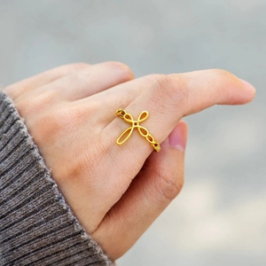 Minimalist s925 sterling silver infinity cross ring in gold finish on female finger
