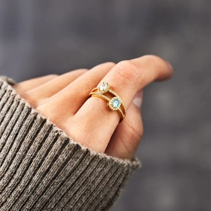 Double layer gold s925 silver ring with oval blue gemstone and cubic zirconia